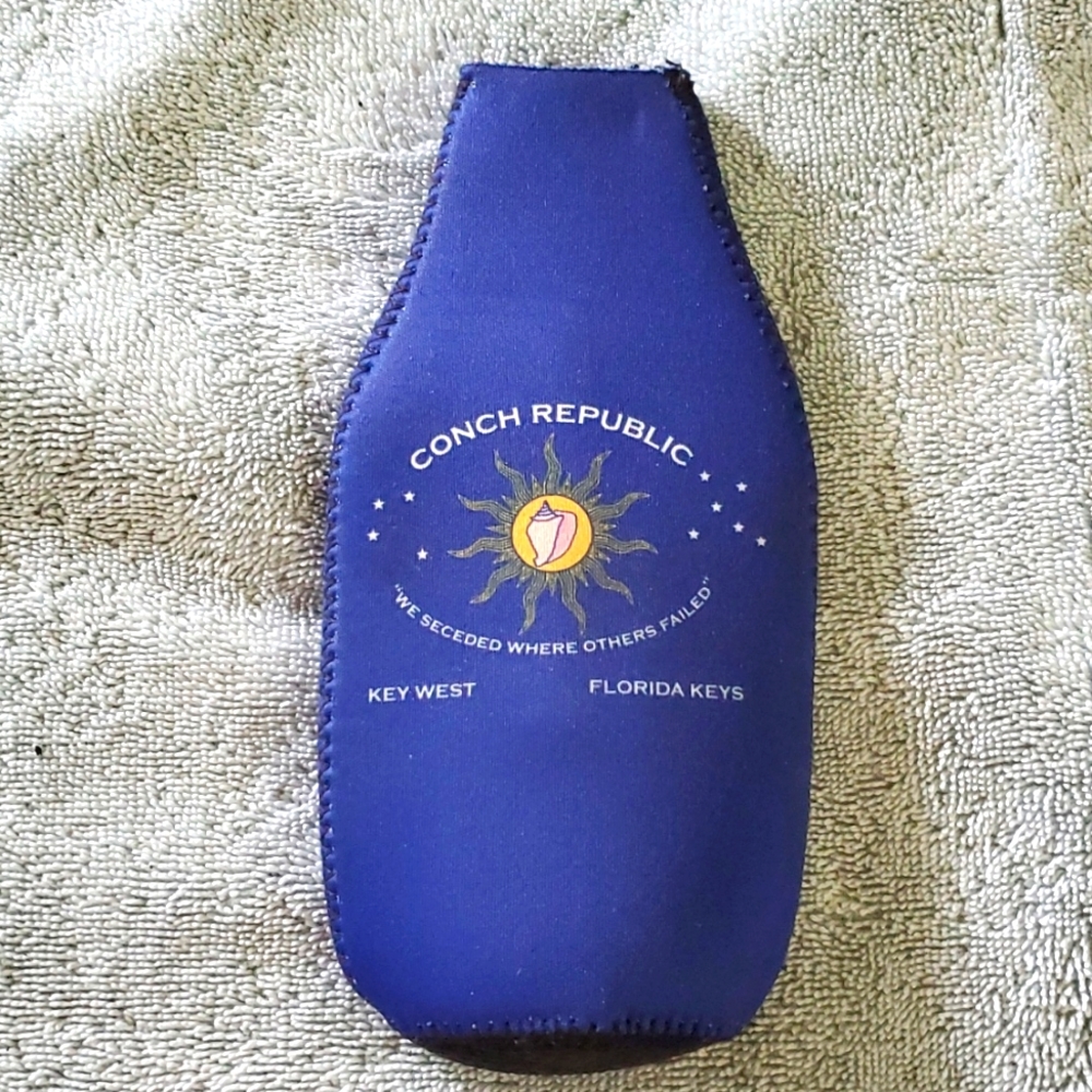 Conch Republic bottle koozi with opener on back